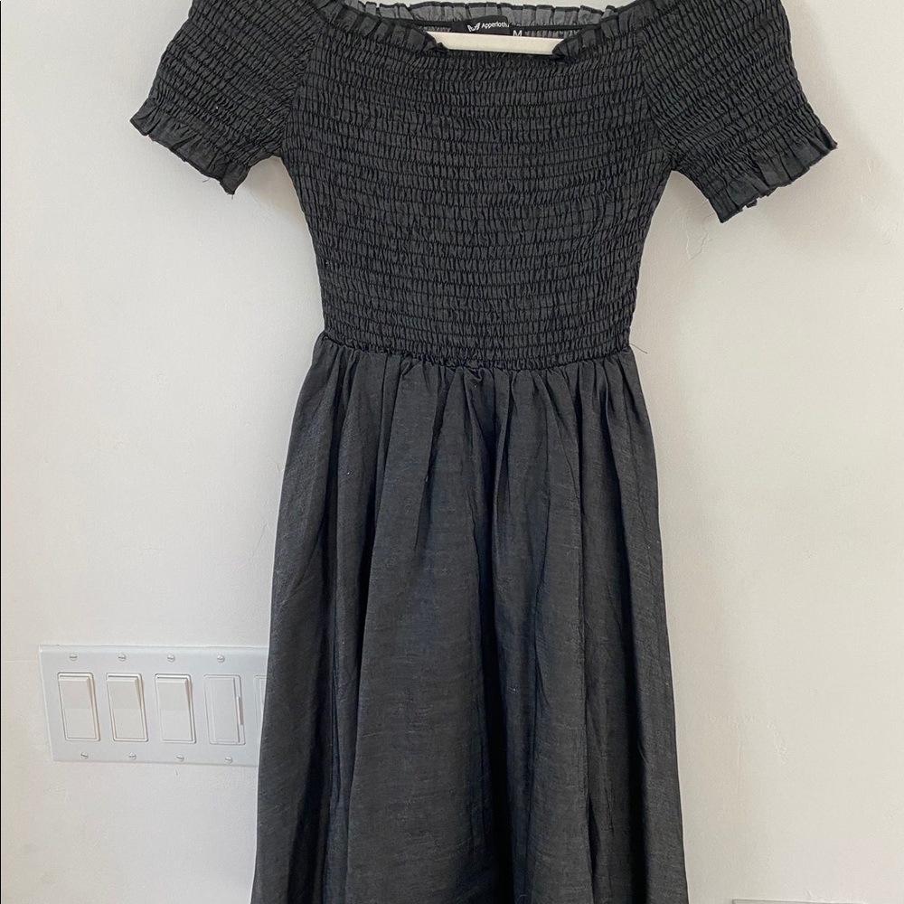 Woman’s dark dress M